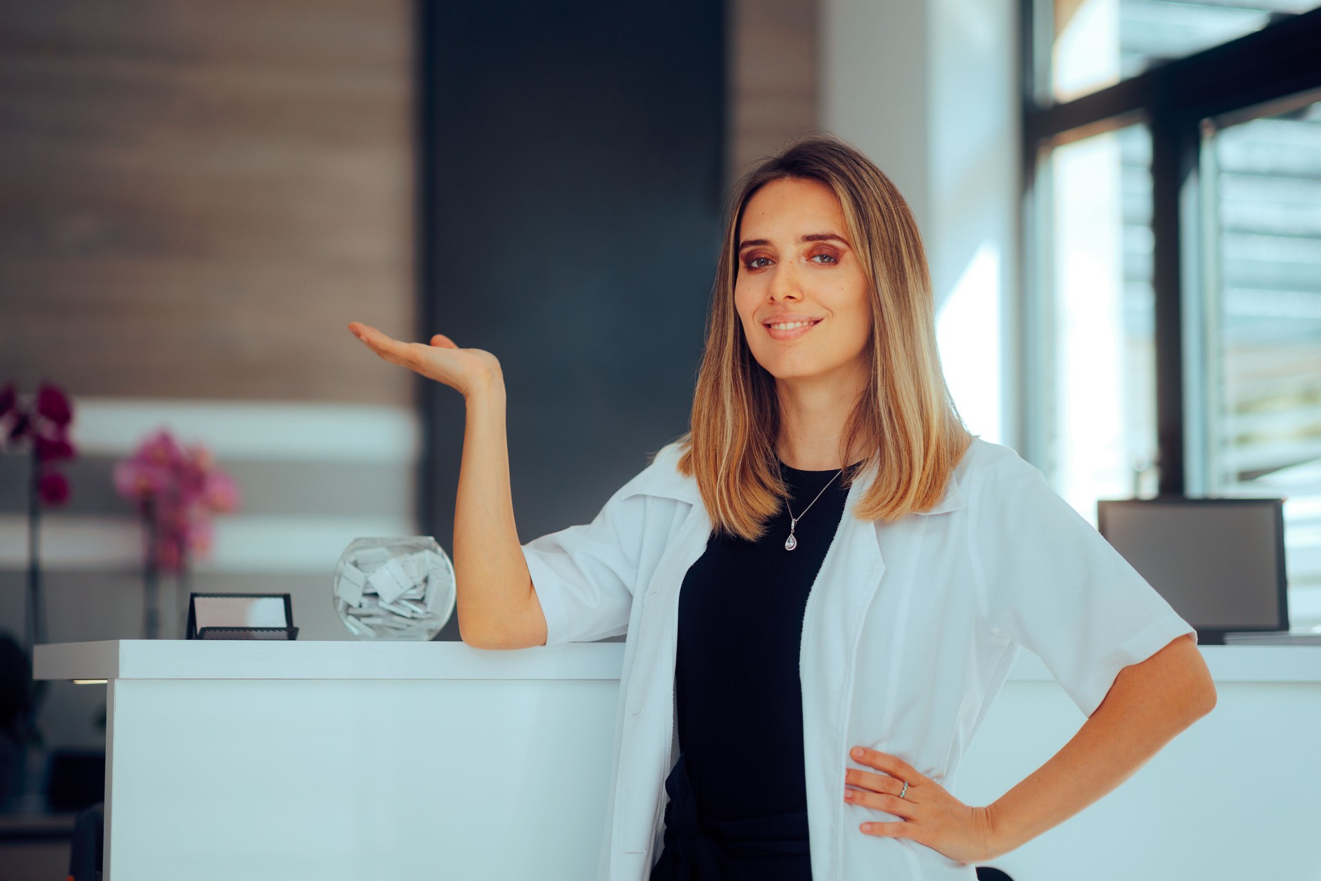 Doctor Showing the Reception of a Medical Clinic with Presentation Gesture